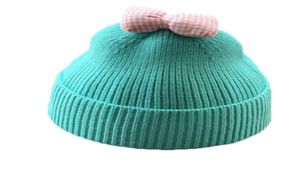 2020 baby autumn and winter wool hat Korean cute bow 13 years old 2 children hat knitted3074827