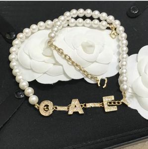 Luxury Charm Diamond Pearl Neckor Designer Märke smycken Tillbehör Brev halsband tröja kedja bröllopsfest Ewelry gåva