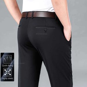 Męskie spodnie Wysoce elastyczne lodowe jedwabne spodnie Męskie Summer Ultra-cienki wygodny żelazo-FR Szybki suszący biznes luźne proste spodnie Y240514