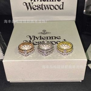 Brand Westwoods wears a double layered two in one ring. can split full diamond matching ring Nail