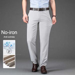 Męskie spodnie Summer Solid Kolor męskie proste spodnie sprężyste materiały bez żelaza Wysoka talia