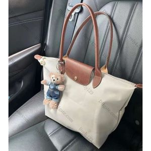 2024 Luxury Designer Canvas Bag Ladies Clutch Tote Bag Messenger Bag Multi Color Shopping Bag Dumpling Bag med axelrem G231062PE-6