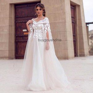 2019年控えめなサウジアラビアのウェディングドレスは肩のアップリケをすくい、チュールの床の長さドバイマタニティビーチウェディングドレス