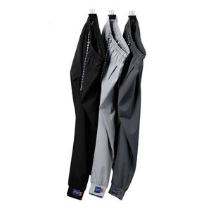 2024 Summer Mens Casual Pants Y2K Fashion Youth Style Jogging Pants Loose Breattable Elastic Sports Pants Slim Fit Pencil Pants 240430