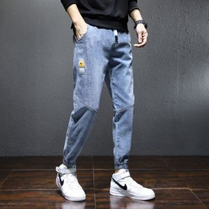 Spring designer dżinsy męskie elastyczne odporne na zużycie spodnie dżinsowe mężczyźni chude ołówek treningowe spodnie swobodne dżinsy męskie damskie obciążenie Hip Hop długie spodnie sporne spodni 5xl