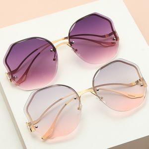 Ny kant transparent lutning rosa solglasögon Kvinnor RIMLESS glasögon Polariserade solglasögon kvinnors varumärkesdesigners trendiga lyxiga solglasögon