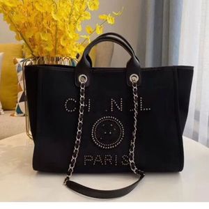 Designer Bolsas de praia de grande capacidade Luxury Pearl Tote Seaside Bolsa de ombro de mulheres bolsas de compra Moda Bolsa Bola Carteira CH0505