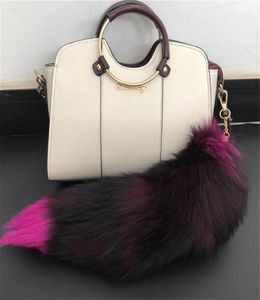 Rose Redreal äkta Red Fox Fur Tail Keychians Plush Pom Poms Cosplay Toy Keyrings Car Keychain Bag Charm Tassels6777502