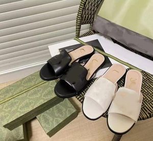 Designer tofflor kvinnor lyx äkta läder sandaler sommar platt toffel metall logotyp fårskinn mode strandskor 35-42