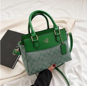 Womens Bag 2023 Ny nischdesigner Fashion Tote Bag med avancerad tryckt bärande crossbody-väska
