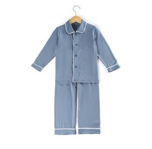 100 Cotton Solid Color Boys Girls Sleep abbigliamento per abbigliamento per la famiglia abbinati per bambini Christmas Ruffle Kids Pajamas Y20011422988382552