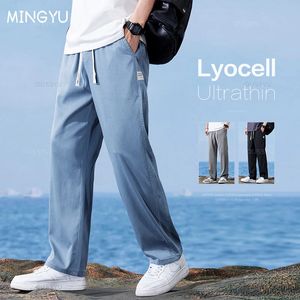 Sommer hochqualitativ gemütliche Lyocell -Stoff Jeans Lose gerade dünne elastische Taille Casual Jeanshose Arbeit Hosen große Größe 240513