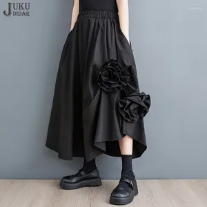 Kjolar solida svart slipsblommor dekoration 2024 sommar koreansk stil casual lång kjol a-line elastisk midja söt slitage jjsk015