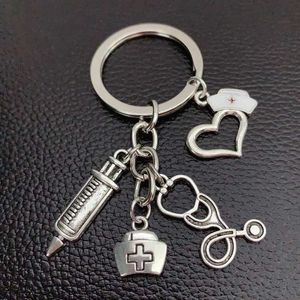 Keychains Lanyards New Nurse Medical Box Medical Key Chain Needle Syringe Stethoscope Keychain Jewelry Medicine Graduate Gift Y240510