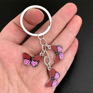 Chaços de chaves de chaves de chaves coloridas para o anel de borboleta colorida Anel de esmalte dos animais voadores -chave para mulheres para garotas Acessorie de bolsa Jóias artesanais Y240510