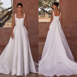 Milla Nova A Line Dress Straps Glitter Sequins Country Wedding Dresses Backless Ruffle Vestidos de Novia Sweep Train Designer Bridal klänningar 0515