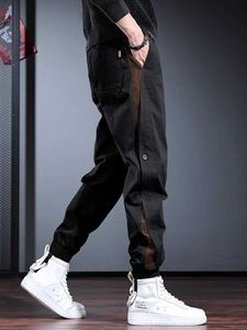 Męskie spodnie mody pasek boku czarne workowate spodnie mężczyzn sportowy bawełniany elastyczna talia sznurka