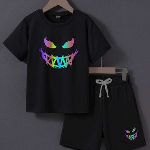 Set di abbigliamento che indossano ragazzi adolescenti per il viso fluorescente nero t-shirt t-shirt tasche pratiche cortometraggi estivi casual set wx