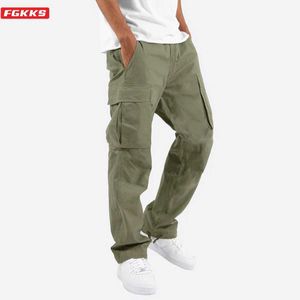 Męskie spodnie FGKKS Nowe spodnie męskie Menów luźne proste wieloposiełkowe stałe kolor wszechstronny zużycie robót bawełniane swobodne spodnie męskie Y240513