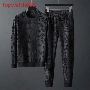 2020 Autumn European goods new personalized simple jacquard round neck long sleeve sweater trousers two-piece men's suit tide