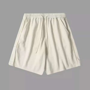 Pu pujia poprawna wysoka wersja 24ss Nowy plaster Triangle Summer Wool Shorts dla mężczyzn i kobiet
