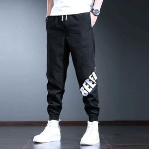 Calça masculina de verão esporte casual joggers calças strtwear letra de moda impressa jogging calças de moletom preto calças de cordão de tração y240513