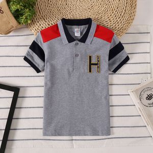 Crianças de roupas de verão Casa de algodão pólo Top Baby menino Retalhes de retalhos t Camisetas de bordado Tee Fashion 2-12 anos de roupa L2405