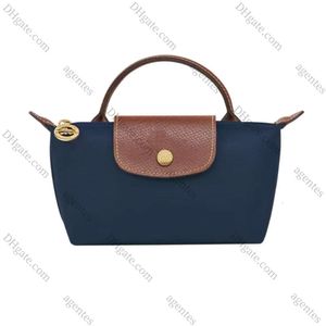 2024 Mini Fashion Cool Luxury Designer Brand Casual Small Shoulder Bag Women Crossbody Handväska Läder Canvas Bag 10A