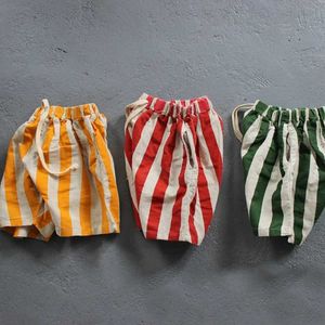 Shorts 2024 New Summer 1-6-year-old baby girl boy shorts cotton linen striped childrens fashion casual pants childrens shorts d240516