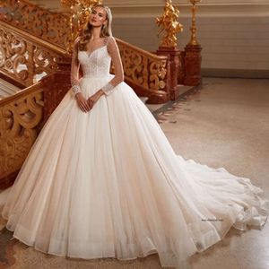 Pärlkulklänning bröllopsklänning för transparent långärmad vestidos de mariage tyll prinsessan brudklänningar 0516