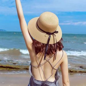 2024 Sommer Womens Sun Hut Strand Damen Mode flache Panama Falten Sie Frauen Freizeitreisen große Krempe Sonnenhut Strohhut 240515