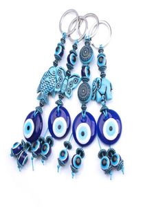 1pc Turquia Evil Eye Blue Keychain 4 Style Resin Animal Peixe Elefante Borbolefly 14mm Maly Eal Blue Bels com vidro redondo key3658191
