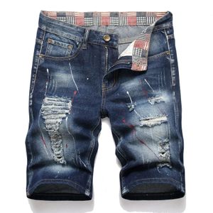 Retro letnie męskie graffiti dżinsowe dżinsowe dżinsy dżinsy niszczą dziurę Plus rozmiar Piąte spodnie spodnie małe odzież marki 240516