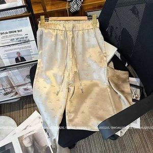 Женские штаны Capris Designer High Elastic Tans Bants Conse с шнуркой из печати атласной ткань Длинные брюки плюс размер Mlxl H4G5