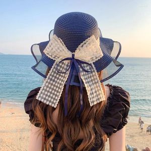 Chapéus largos da borda Moda feminina Moda Big Eaves Straw Chapeira de sol e protetor solar Sun Outdoor Beach Trendy