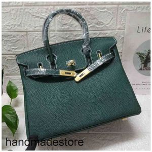 Bolsa de bolsa de grife 2024 Dark Platinum Green Fashion Leather Lock de mão feminina 30 com 35 116f