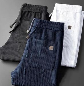 Designer calças de corrida de moda marca de luxo masculino calça de cor sólida casual calça de harém calças de harém