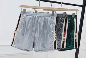Letnie nowe, swobodne spodnie Para męskie spodnie importowane górne lodowe jedwabne odblaskowe miękkie litery tkaniny nadrukowane szwy krótko301865