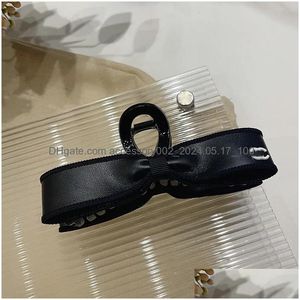 Клипы для волос Barrettes Bow Women Claw Clamps черные белые дизайнерские ювелирные ювелирные украшения Crab Cross Fashion Девочки ежедневные аксессуары бросают доставку Hairj Otg4i