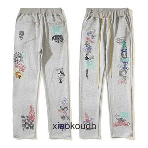 Rhude High End Designer Byxor för High Street Cartoon Comics Handdrawn Teenage Men and Women samma stil parhoppsvakt med 1: 1 originaletiketter