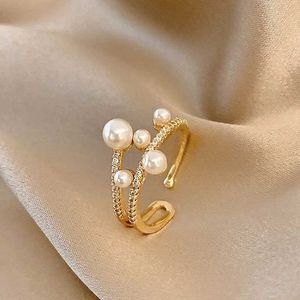 Bandringar Elegant Crystal Pearl Beads Womens Justerbara ringmodemärken smycken unika öppna förlovningsringarstillbehör J240516