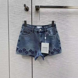 Kvinnors jeans nanyou cowboy kläder xiaoxiang 24 Vår/sommar Nytt blomma mönster kontrast broderi hög midja smala denimshorts för kvinnor