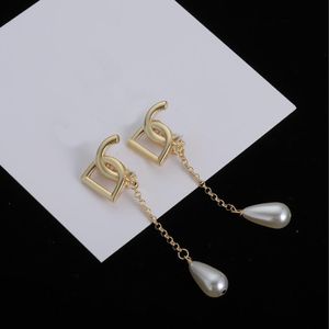 Orecchini di designer d'oro semplici orecchini a sospensione perle lunghe gioielli di alta qualità per regali di nozze