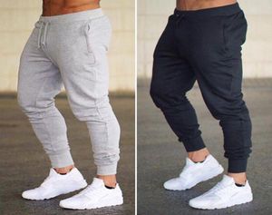 fit sports Slim pants men039s running solid color pants fitness feet casual pants tether tights men039s5591481