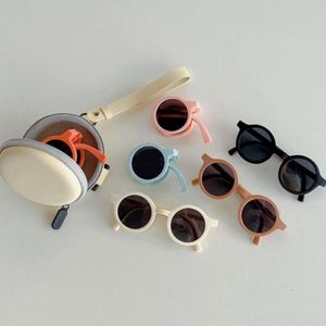 2023 Nowe składane okulary przeciwsłoneczne Dzieci okrągłe rama chłopiec dziewczyny Baby Portable na świeżym powietrzu Uv400 Ochrona oka klasyczny gogle okulary