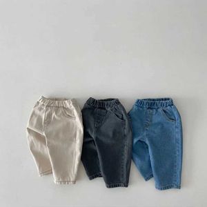 Trousers 2023 Autumn New Baby Casual Pants Solid Children Trousers Baby Pocket Jeans Fashionable Childrens Uterine Pants Boys and Girls Pants d240517
