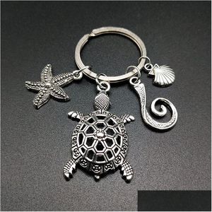 Nyckelringar Antik nyckelringhållare Sea Animal Keyrings Starfish Turtle Shell Sier Charms bilkedja smycken Fashion Promotion Favor Dr Dhfjt