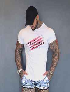 Nya träningskläder Bomull Rise Gym T Shirts Mens Kort ärm Tshirt Muskel Gym Fitnesskläder 2021 Bodybuilding Tops C0241273360