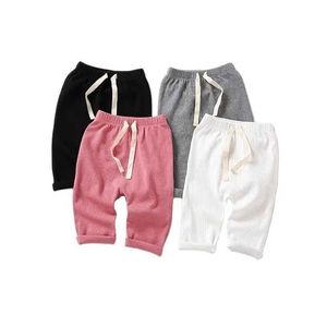 Calças meninos e meninas calças calças recém -nascidas algodão com nervuras de algodão, travessia de roupas de criança moda e fofa calças de harém de harém de bebê pp d240517