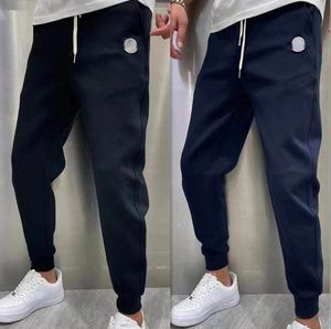 Men's Clothing Mens calças novas calças de designer de crachá com padrão de painéis de basquete solto Pants Sport Casual Nine Points Sort para Man Woman